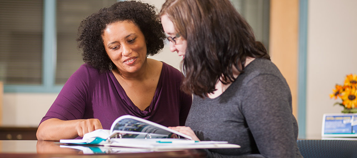 Advisor helps students with enrollment