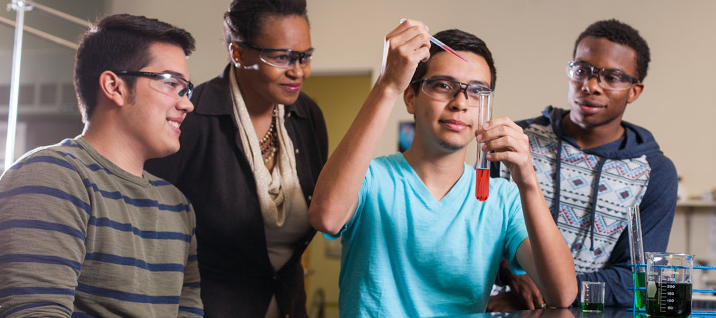 Students in Chemistry Lab mixing chemicals