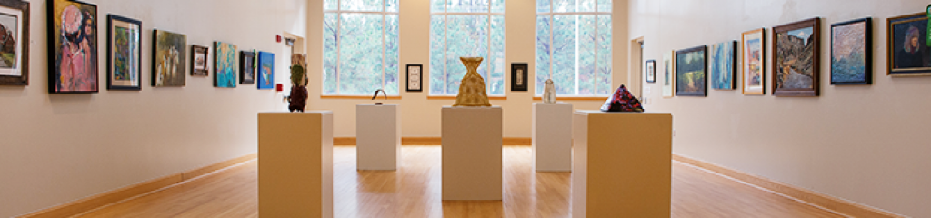 Sculptures and paintings displayed in art gallery