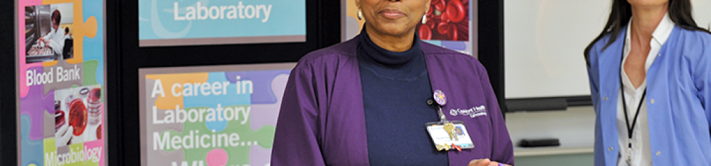 Female teacher discusses laboratory medicine
