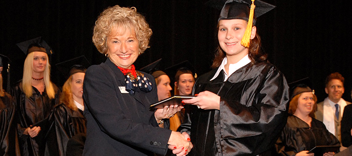 A Gaston graduate receives her diploma