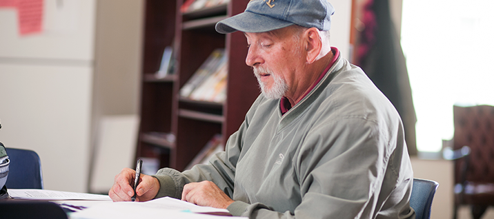 Veteran student works on homework