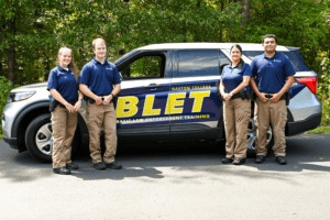 BLET students and car