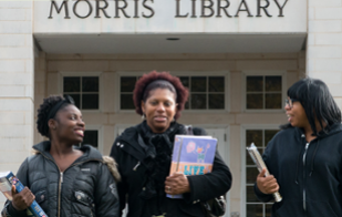 Female students walking together on Dallas Campus