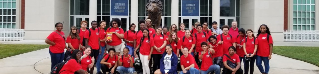 Gaston College Upward Bound students posing outside the Levine Museum