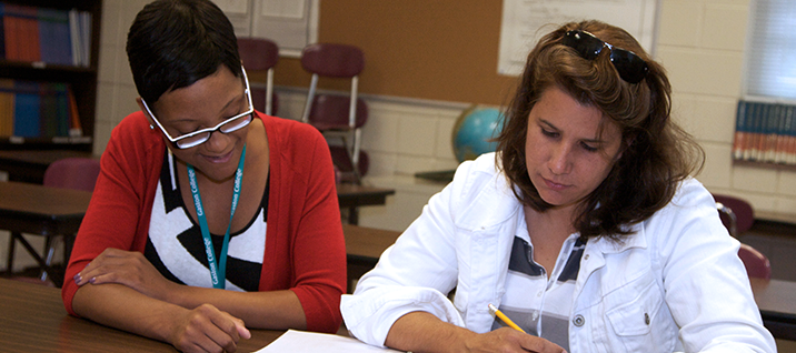 Student receives help from advisor
