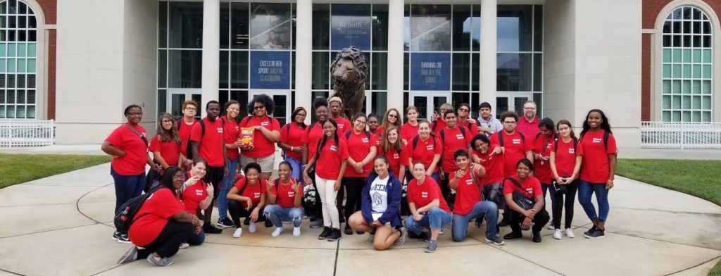 Gaston College Upward Bound students posing outside the Levine Museum