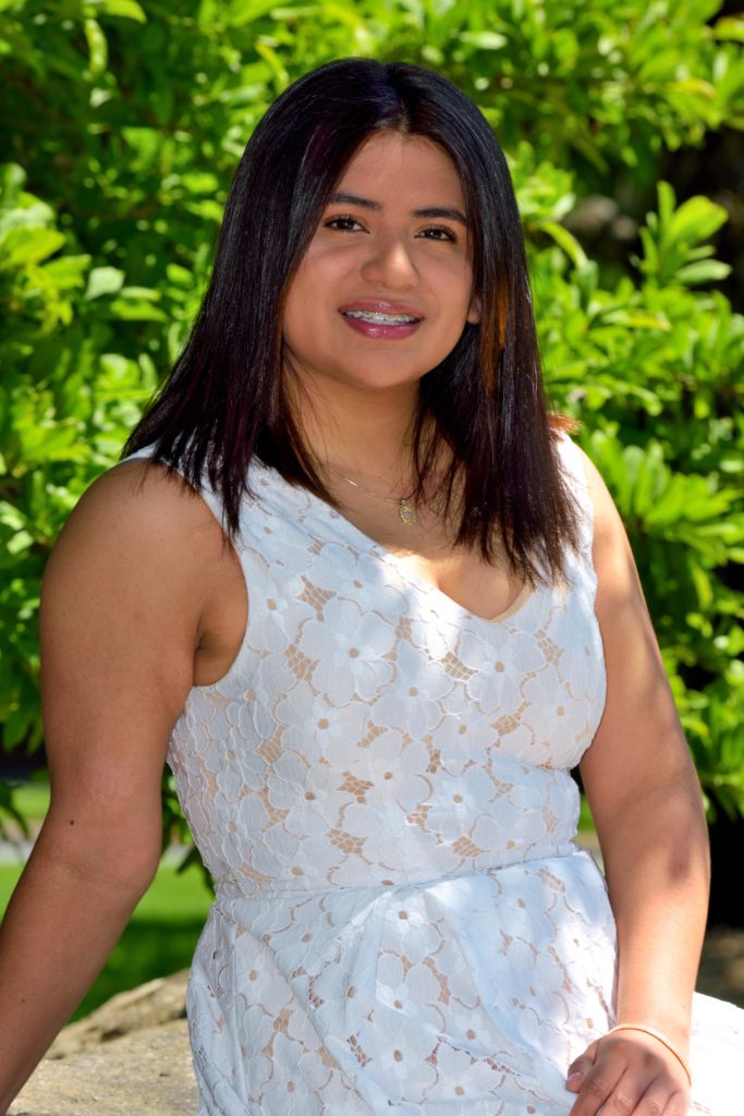 Female posing and smiling