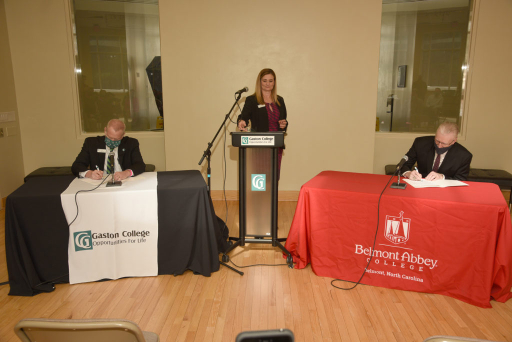 President of Gaston College and President of Belmont Abbey sign a transfer agreement