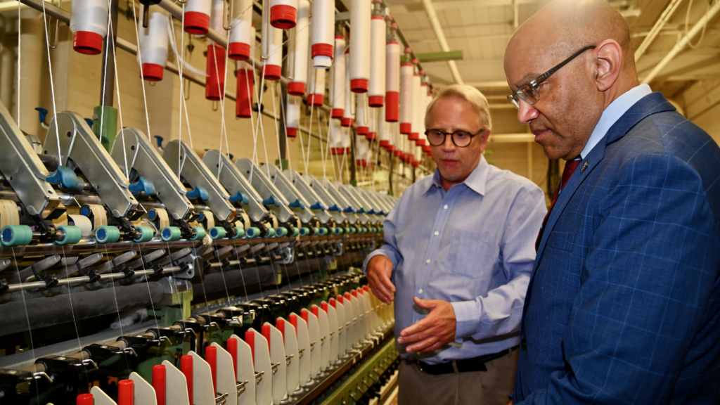 NCCCS President Stith receives a tour of the Textile Technology Center at Gaston College