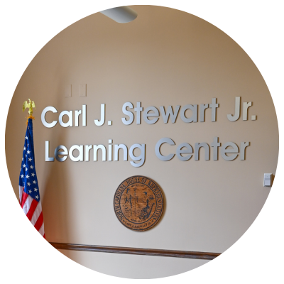 Click here to learn more about Learning Center dedication honors long-time college attorney